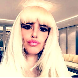 OnlyFans Model Andy Rise with Long Blonde Hair and Red Lipstick