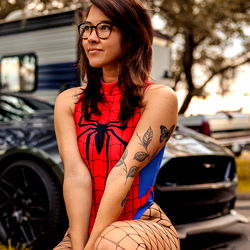 Amber in Spider-Woman Costume Posing Outdoors