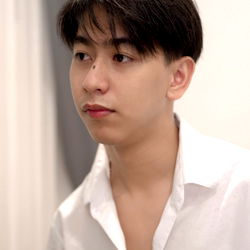 Anis, a young individual captures the frame in an indoor setting