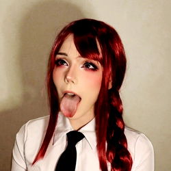 Alicia, the punk rocker with vibrant red hair and a rebellious spirit