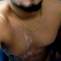 Shirtless Man in Bathroom