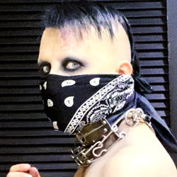 Euro-Style Fashion Model with Piercings and Tattoos