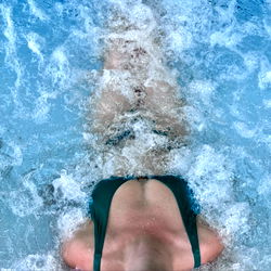 Female Swimmer in Green Bikini