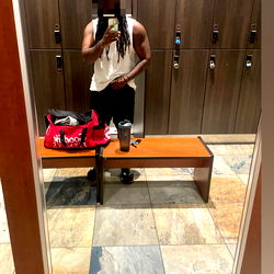 Fitness Guru in Gym Mirror