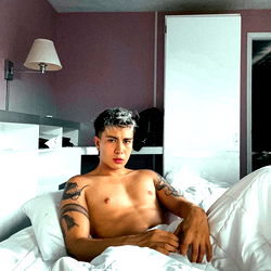 OnlyFans Model in Bedroom Setting