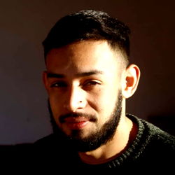 Young Man with a Beard and Tattoo