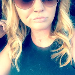 Mace in Sunglasses, Tank Top and Mini Skirt, Driving at Night