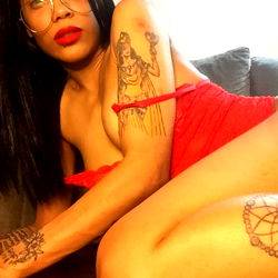 An OnlyFans Model in a Red Lingerie