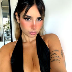 Cande, a Model Posing for a Selfie