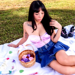 Onlyfans Model Sitting on Blanket Outdoors