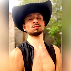 Roman Fenix in Cowboy Hat and Leather Vest