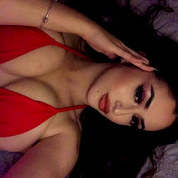 OnlyFans Model Showcasing in Red Bikini