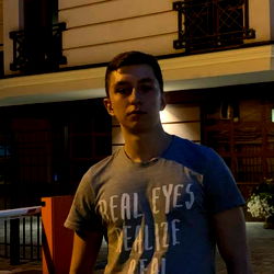 Person in a t-shirt at night