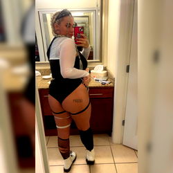 Mira, a wrestling enthusiast, flaunts her athletic physique in black and white