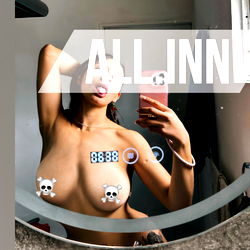 Model Showcasing Tattoos and Bikini