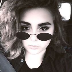 Stylish OnlyFans Model Behind Car Window