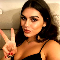 Woman Posing with Peace Sign