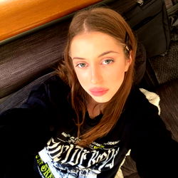 Kaylee, a model posing for the camera.