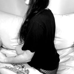 Female Model in Racy Lingerie on Couch