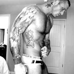 OnlyFans Model KosherDill37: Muscular Man in Briefs Showing Off Tattoos