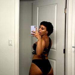 Anais, a Florida-based OnlyFans model showcasing her curves in a black bikini