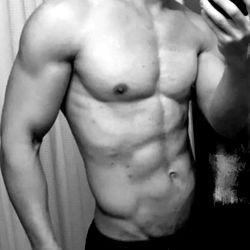 Fit and Muscular Man in Mirror Selfie