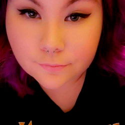 A Purple-Haired Individual Sharing a Moment on OnlyFans