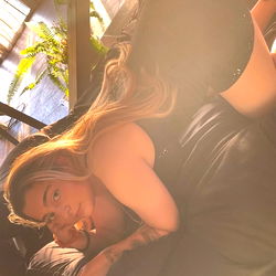 Jess, OnlyFans Model Resting On Couch