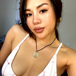 Vietnamese Model Posing in Tank Top