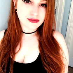 Aly, a Red-Haired Female with Long Hair and Makeup