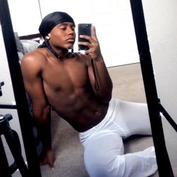 Dajai Anderson on OnlyFans, showcasing his fitness and style in a mirror selfie