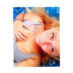 Blond Hair Onlyfans Model in Tattoo-themed Bra