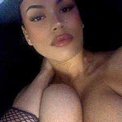 Model in Lingerie with Fishnet Stockings