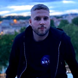 Asanza, the Cool Guy from Madrid, Sitting on a Roof