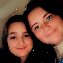 Two young girls posing for a selfie