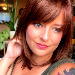 A Stylish Tattooed Female