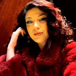 Stylish Woman Posing with a Mirror