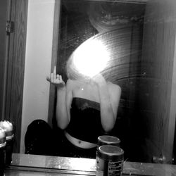 Reflective Mirror Selfie in Bathroom