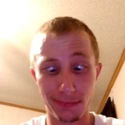 Zach from Pennsylvania, in front of a ceiling fan