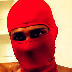 Ahmadxxx20 in a Vibrant Red Mask