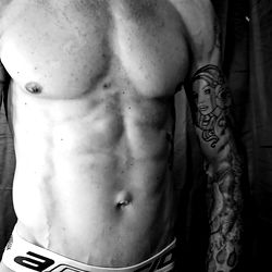 OnlyFans Model Robert Liljeholm, Showcasing His Muscular Physique in a Shirtless Photo from Muskegon, Michigan