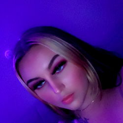 OnlyFans Model Baby: A Glamourous Purple Photo