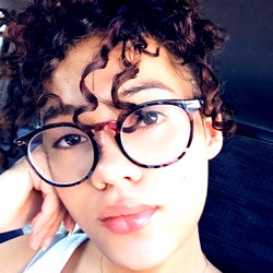 Stylish Curly Hair in Glasses