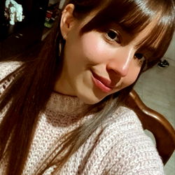 Guadi, a young woman with long brown hair