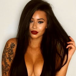 Australian Model Showcasing Tattoos and Black Outfit