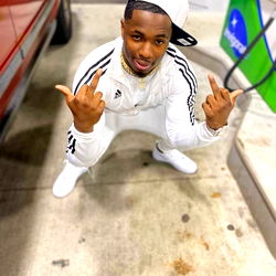 NastymanQ in a Stylish Outfit