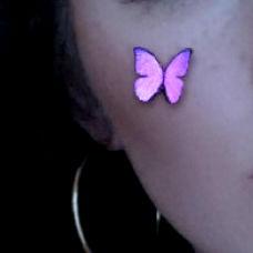 Brunette Model with Unique Butterfly Tattoo