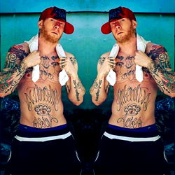 Rhett Vandal: Tattooed Athlete in Sweatshirt and Hat