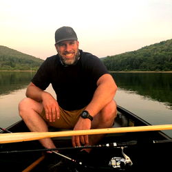Expert Fisherman Posing with Catch