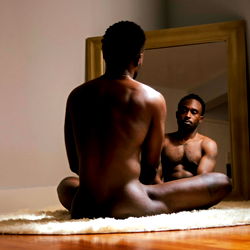 Intimate Portrait: A Model's Reflection in a Mirror